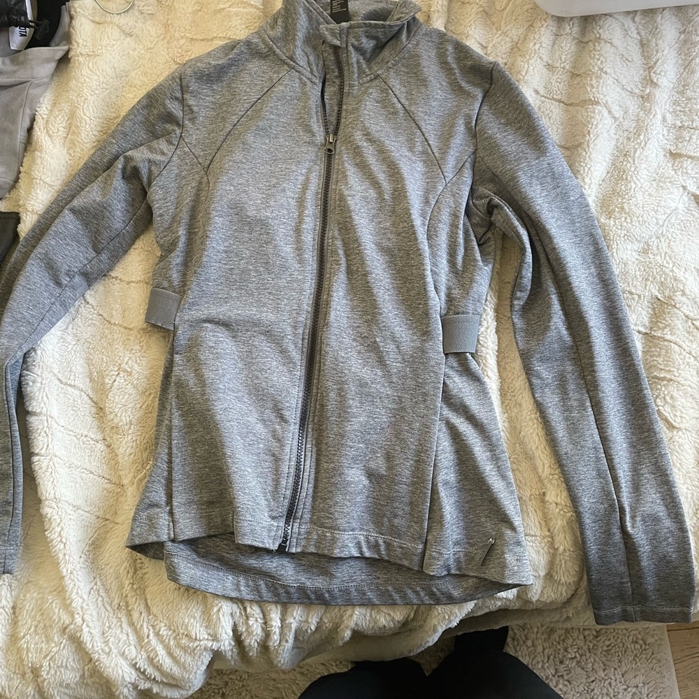 Grey Mondetta work out zip up. Tight to skin fit